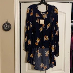 Navy blue dress shirt with lice cut outs on bodice front and back and sleeves